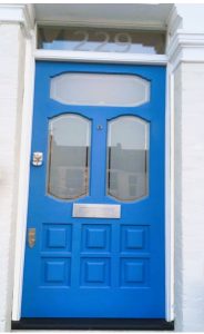 Close up of blue front door with glass insert